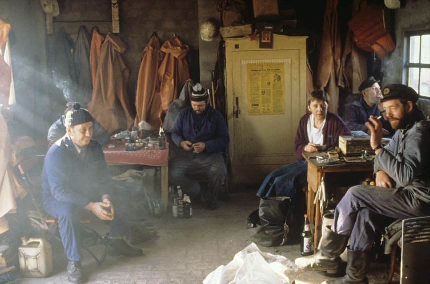 Young Angela Merkel having a Schnaps with fishermen on the island of Rügen during her first MP campain in summer 1990.jpg