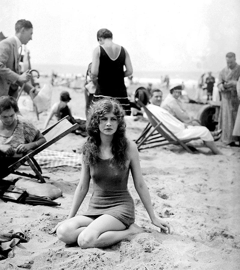 A young woman at the beach in Deauville, France, 1925.jpg