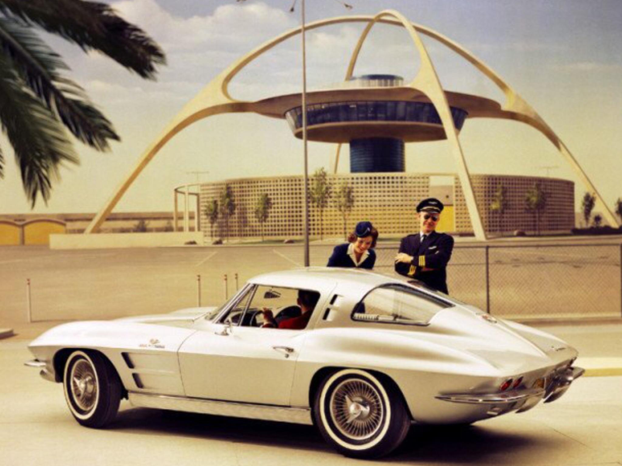 Checking out the new Corvette - 1963.jpg