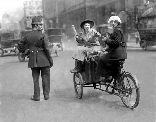 Riding on a cargo bike in London, 1920s.jpg