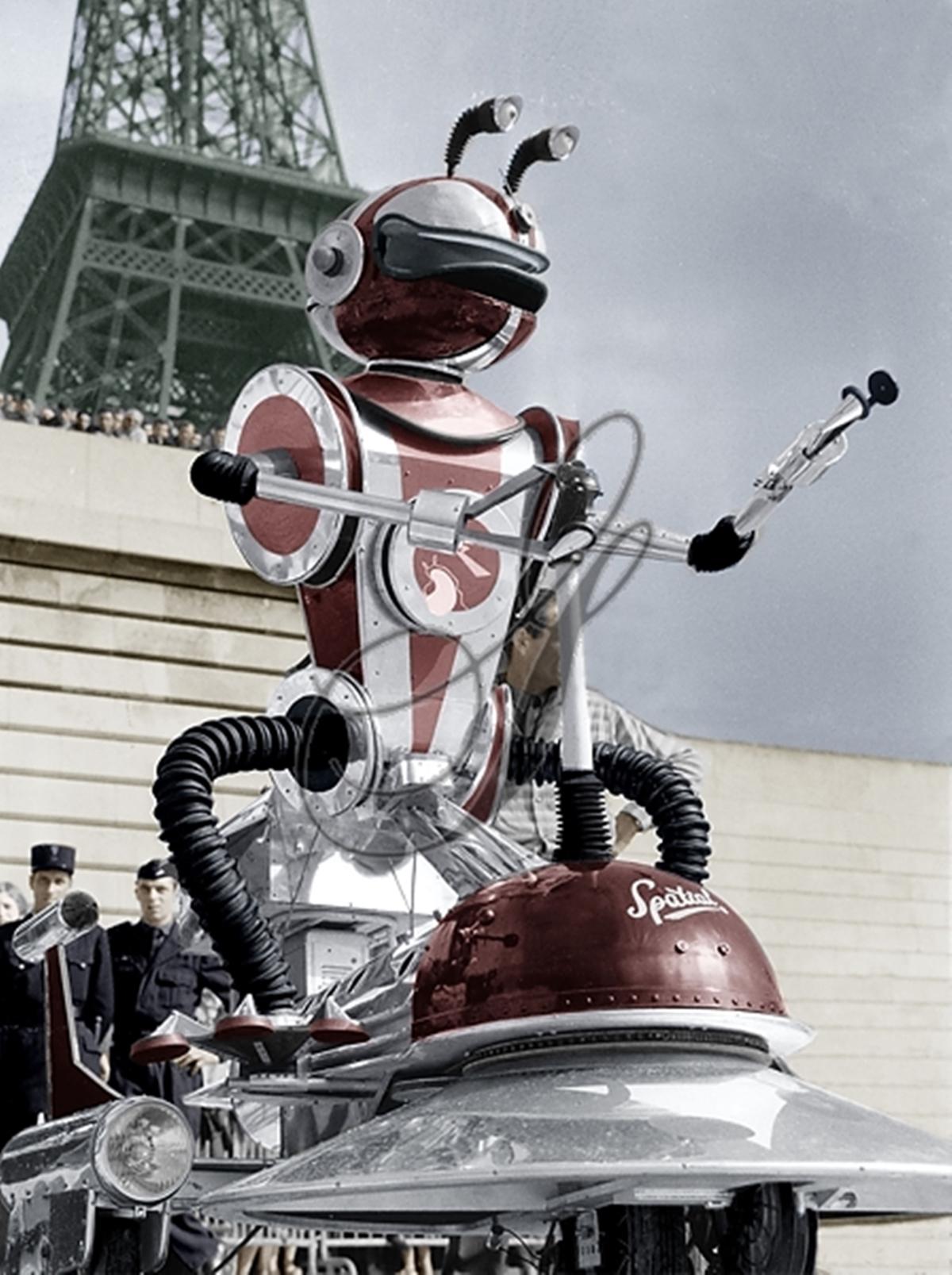1958 Cosmo the Robot, French message-delivery robot on an electric scooter.jpg