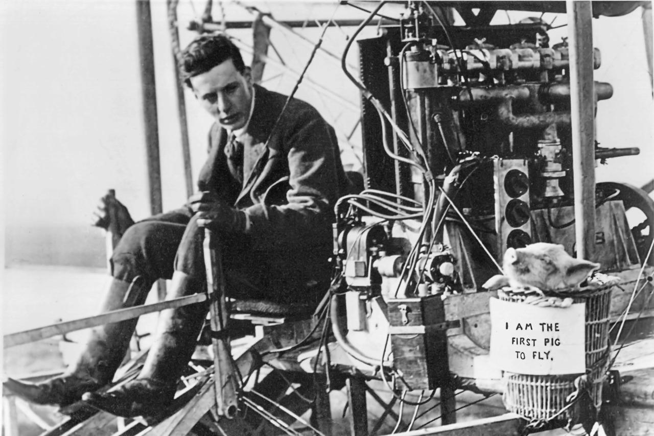 The first recorded flight of a pig at Leysdown in Kent, England, November 4, 1909. The pilot is J.T.C. Moore-Brabazon, I don’t know the pig’s name..jpg