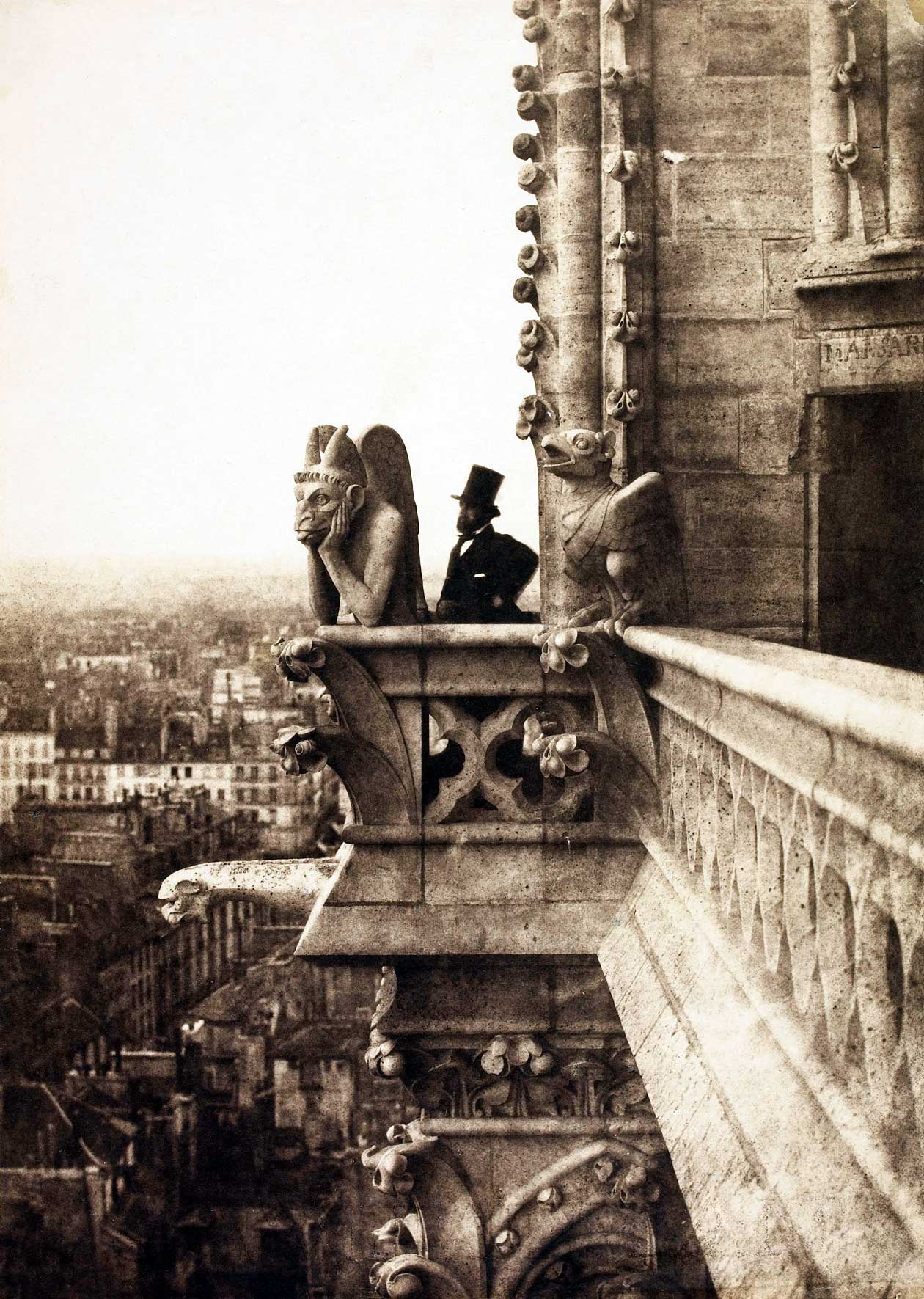 The Vampire, a salt print by Charles Negre of a man with a gargoyle on Notre Dame cathedral, 1853.jpg