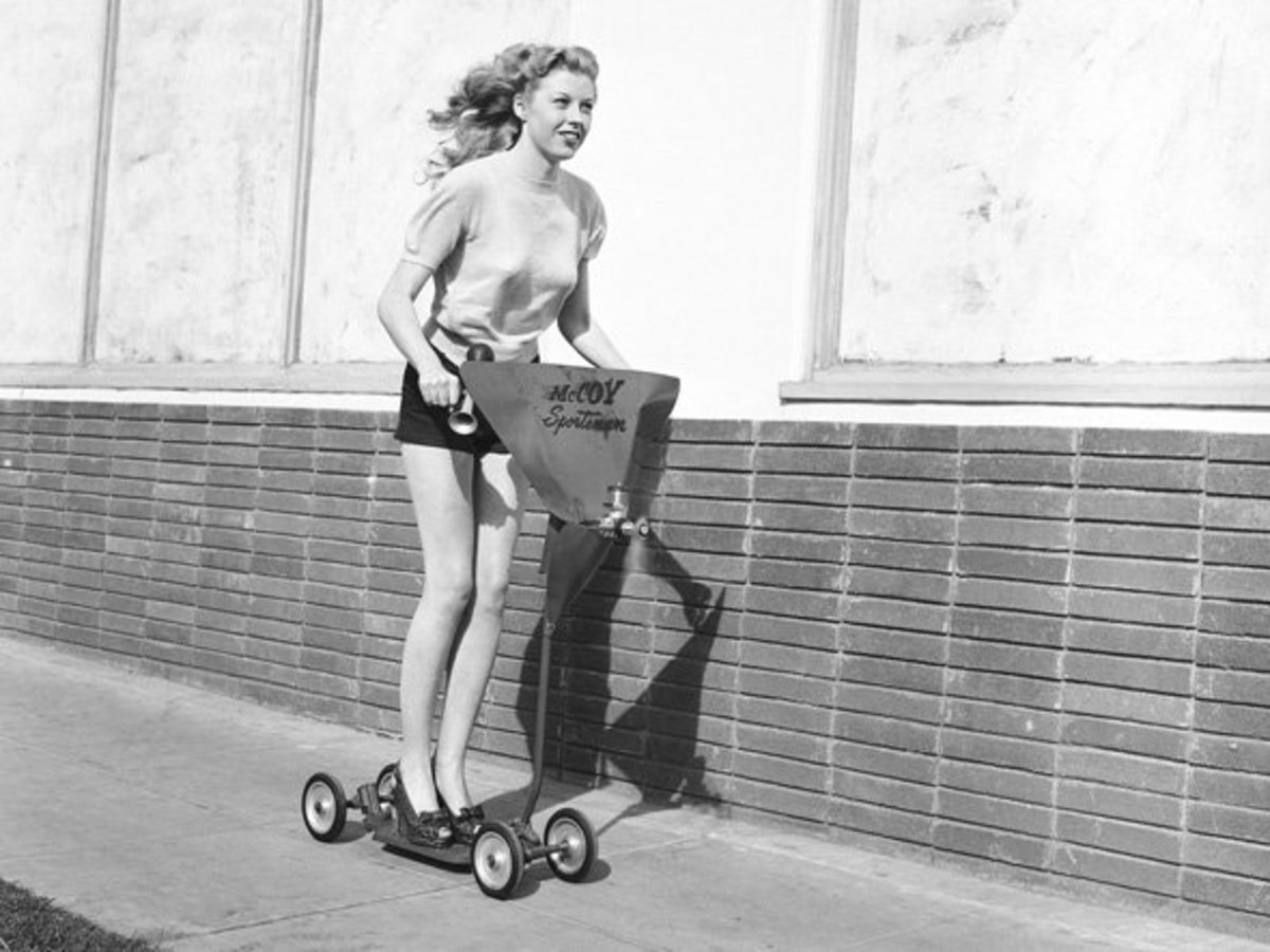 Linda Mason sails along on an motorized scooter called the McCoy Sportsman in Hollywood, CA, March 14, 1949.jpg