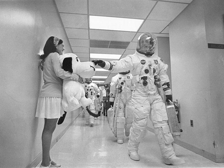 Commander Tom Stafford pats the nose of a giant stuffed Snoopy on his way to the Apollo 10 launch pad. 1969.jpg