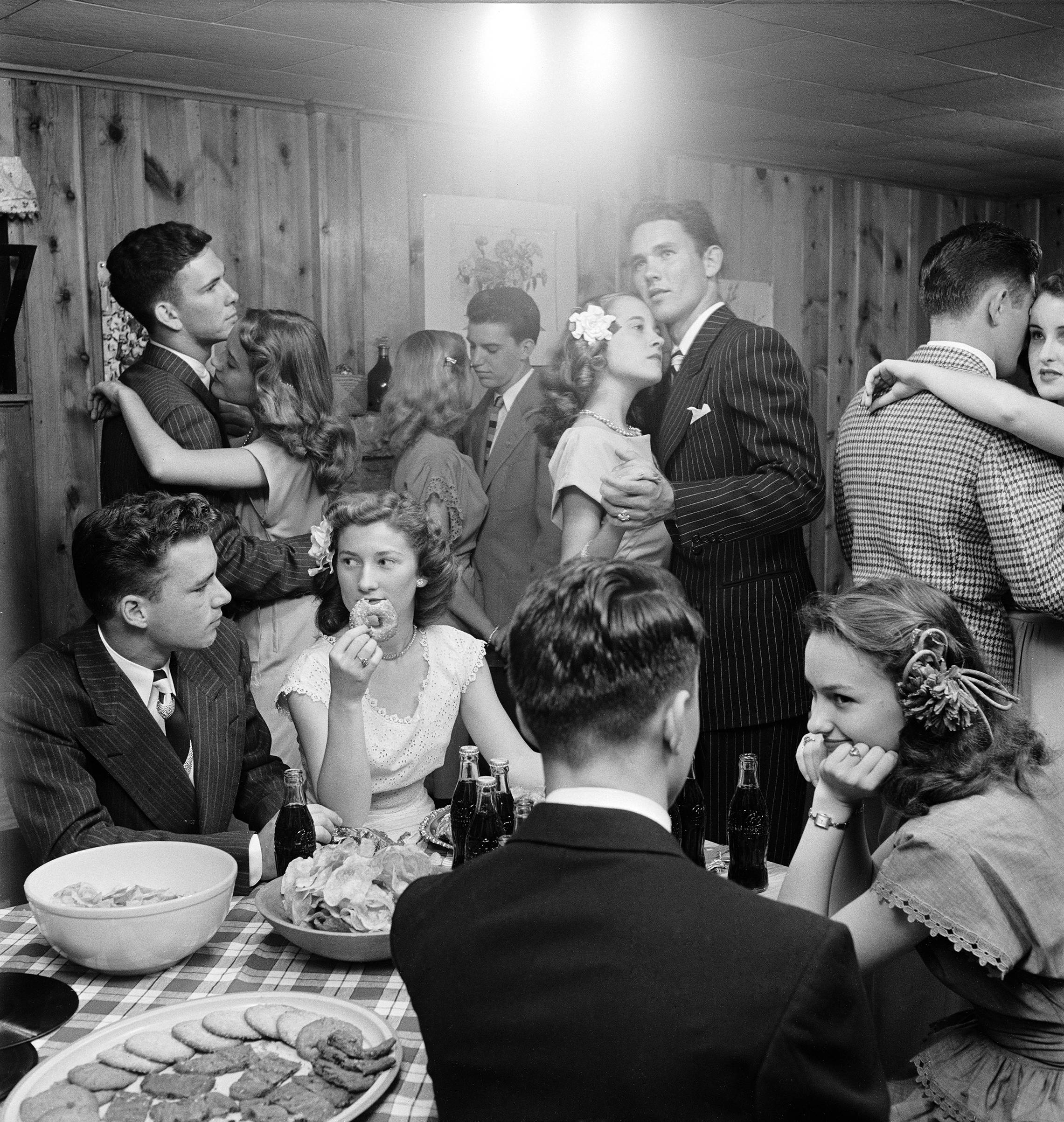 Teenagers dancing and socializing at a party, 1947.jpg