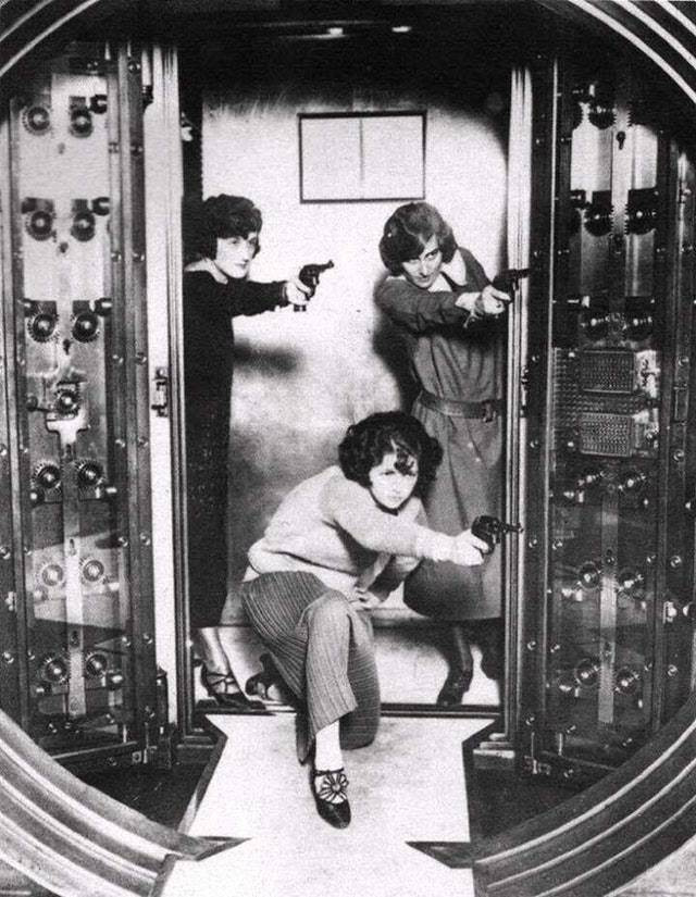 Three employees of the Cleveland Trust Bank Co. being trained to defend the bank vault in the company’s office, 1924.jpg