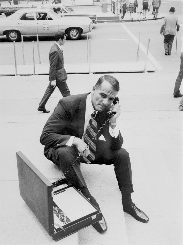 Gene Johnson with a Marlin American device (FM transmitter,decoder, antenna, battery in a briefcase), 1969.jpg