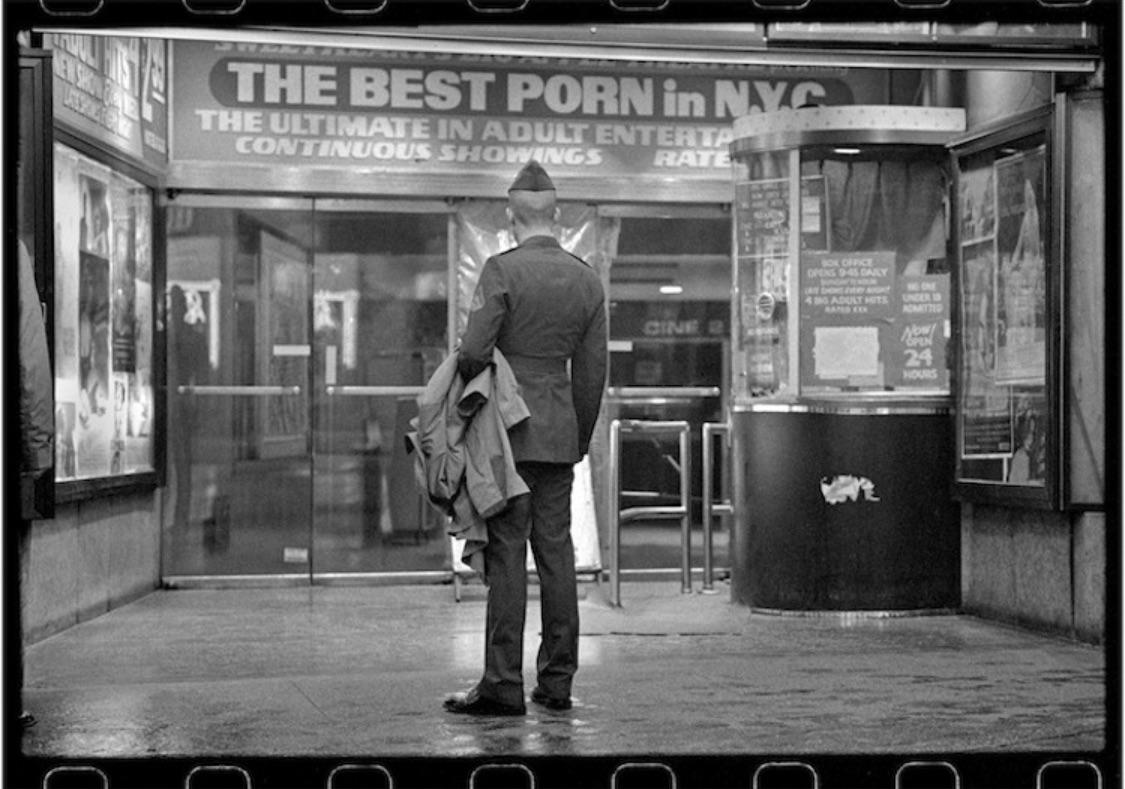 1980s - A soldier ponders his options in Times Square, NYC.jpg