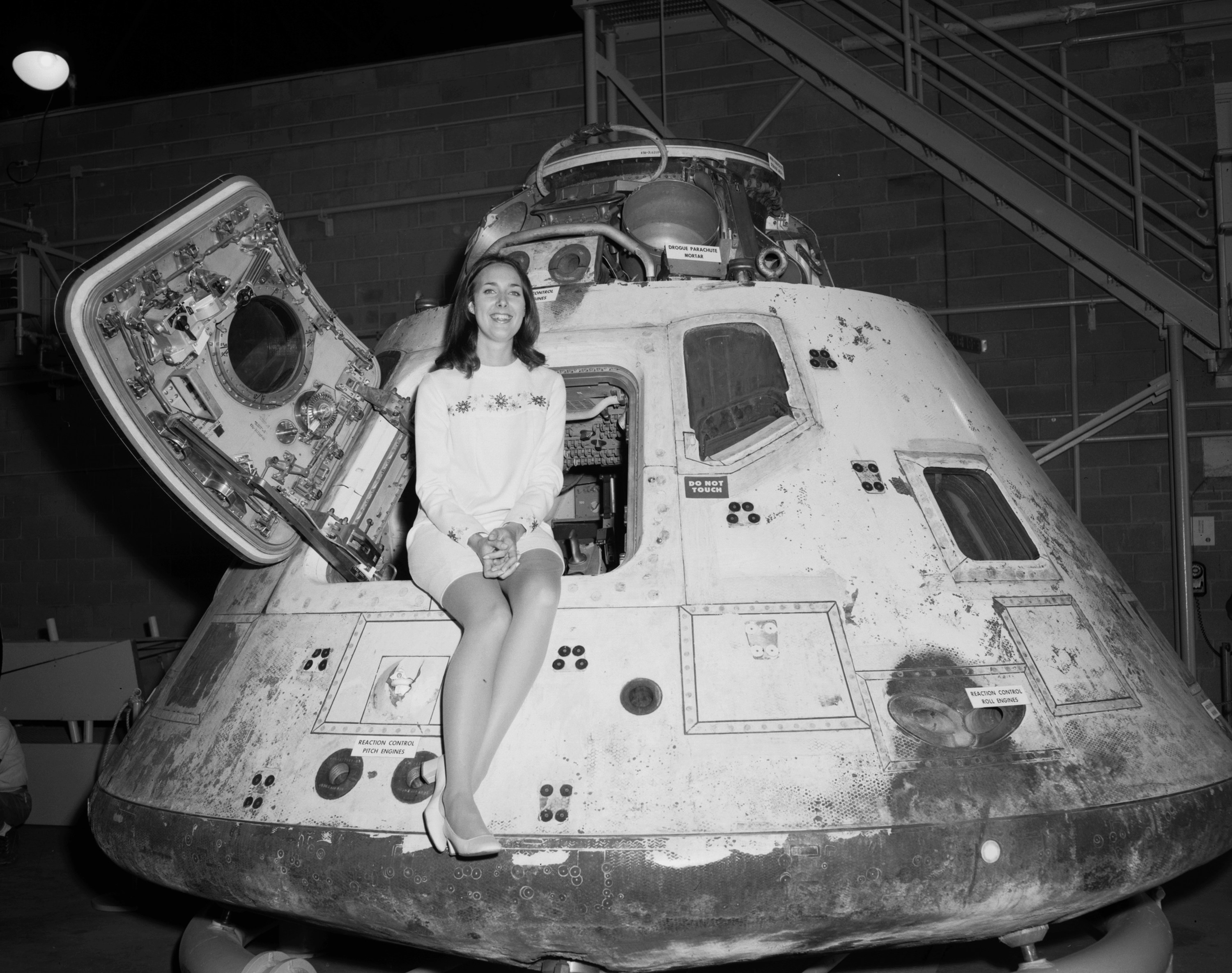 Miss NASA 1971 posing on the Apollo 8 capsule in Houston, Texas, US in 1971.jpg