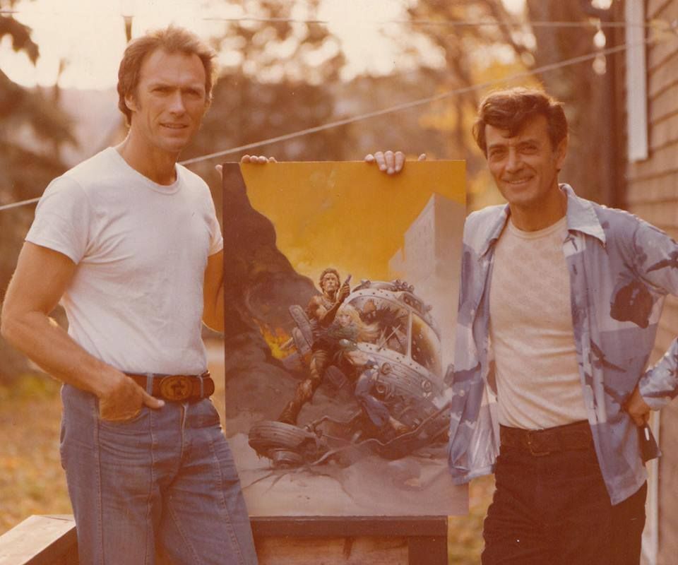 Clint Eastwood & painter Frank Frazetta with Frazetta's movie poster for 'The Gauntlet', 1977.jpg