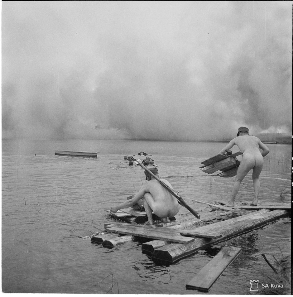 Finnish troops cross a lake under a smokescreen, Hiisjärvi, July 1942(1).jpg