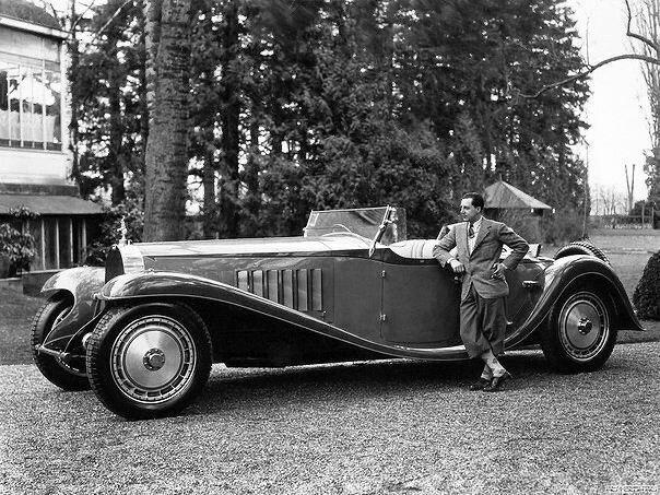 Jean Bugatti with his creation - Bugatti Type 41 Royale. 1920s.jpg