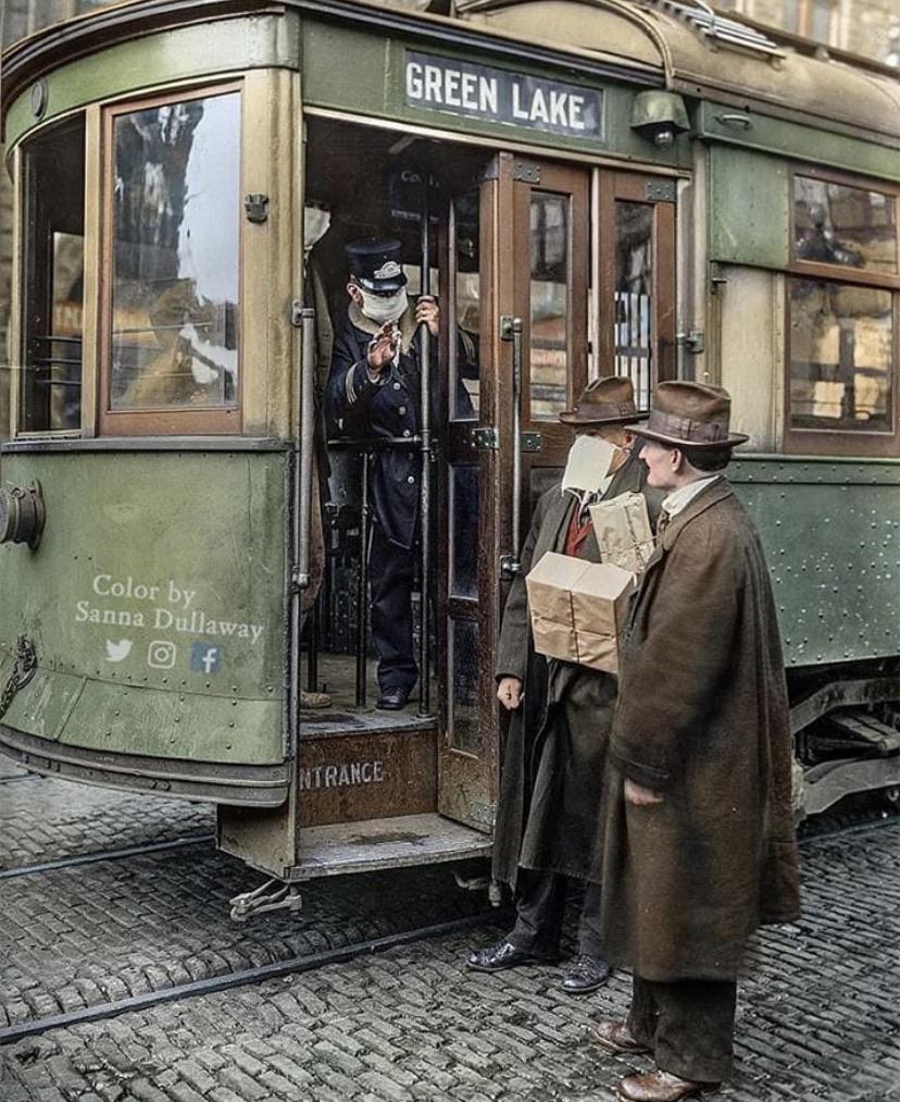 A street cart conductor not allowing passengers aboard without a mask during the Spanish Flu pandemic in Seattle 1918.jpg