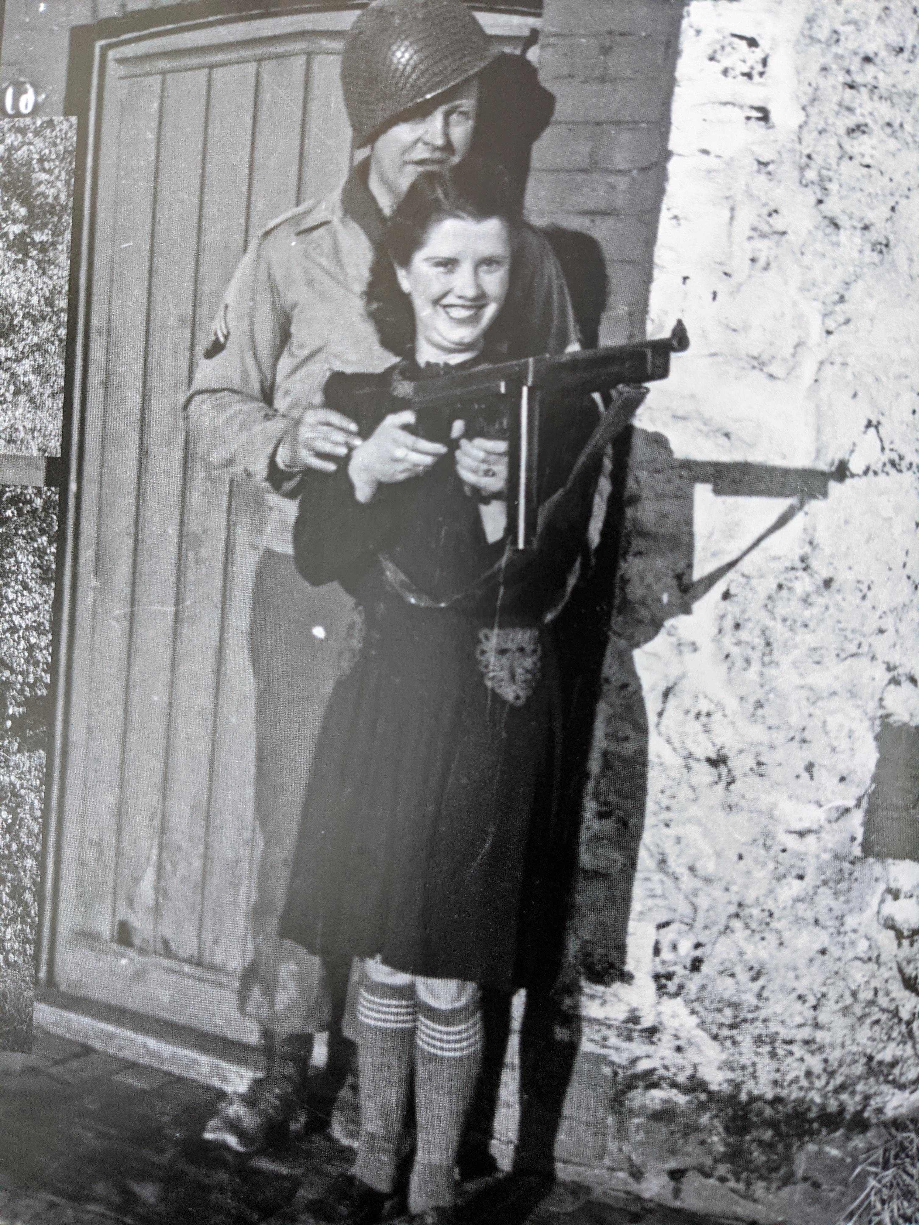 My great-grandpa and one of his German girlfriend's during WWII.jpg