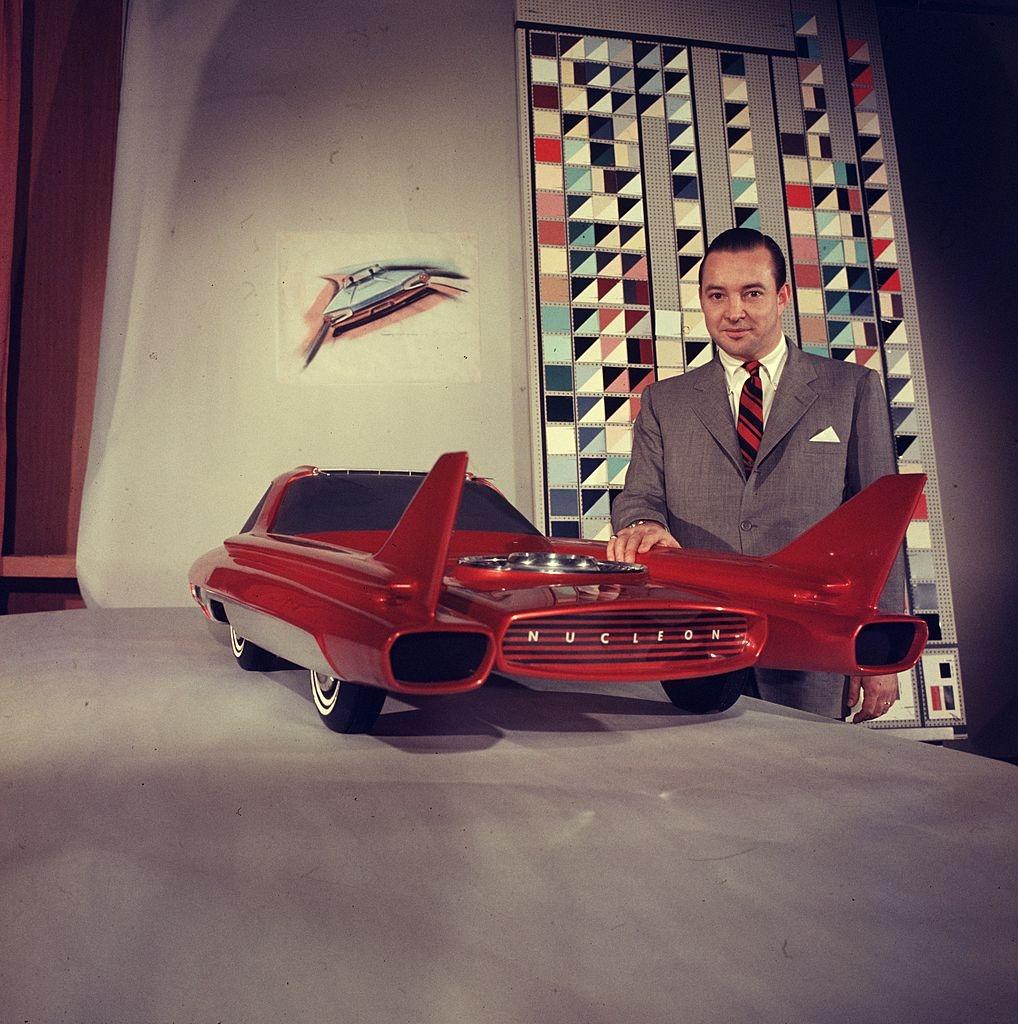 William Ford with a model of Ford company's nuclear powered concept car the 'Nucleon'. June 1957.jpg