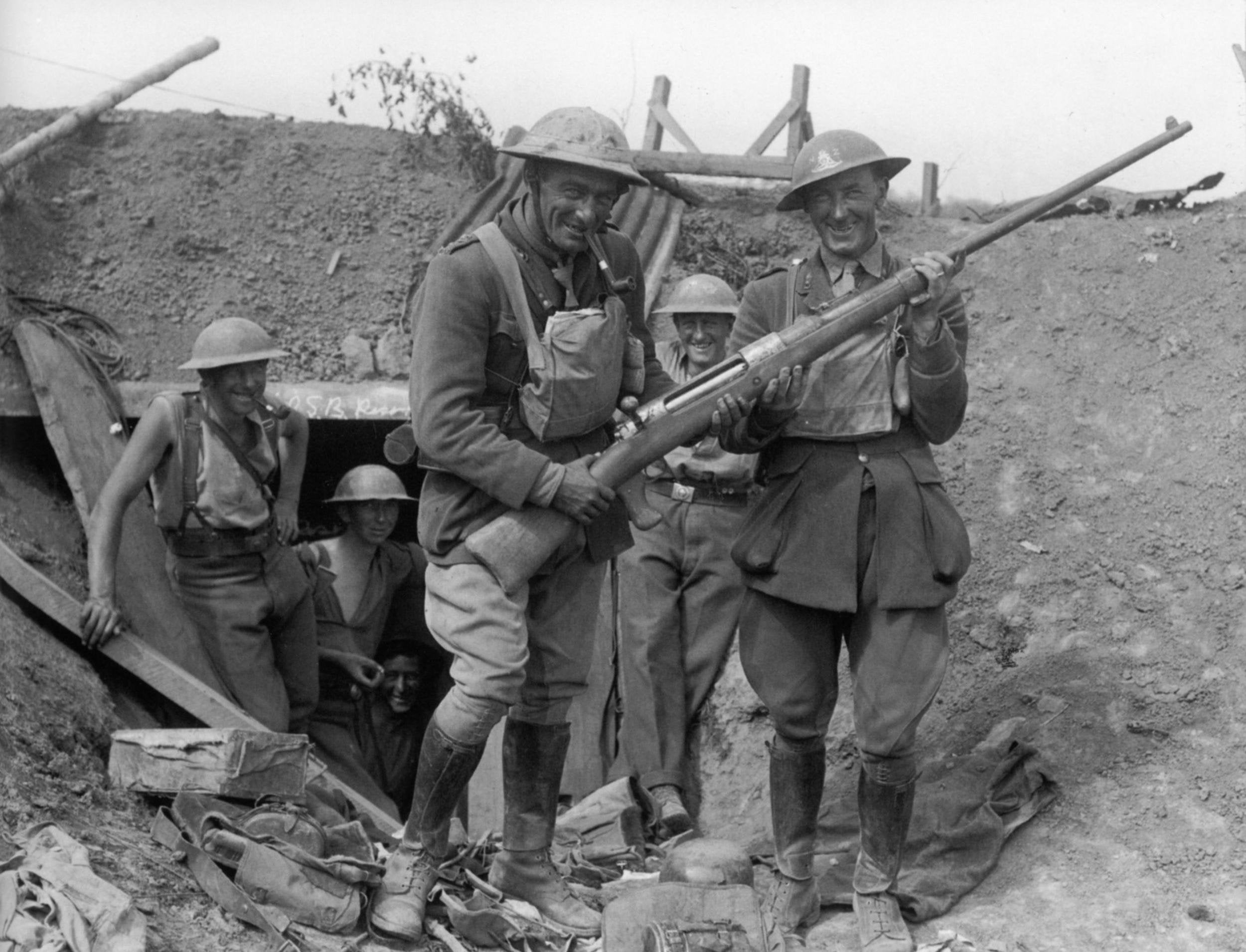 New Zealanders posing with world's first anti-tank rifle, German Tankgewehr M1918, Grévillers, August 25th, 1918.jpg