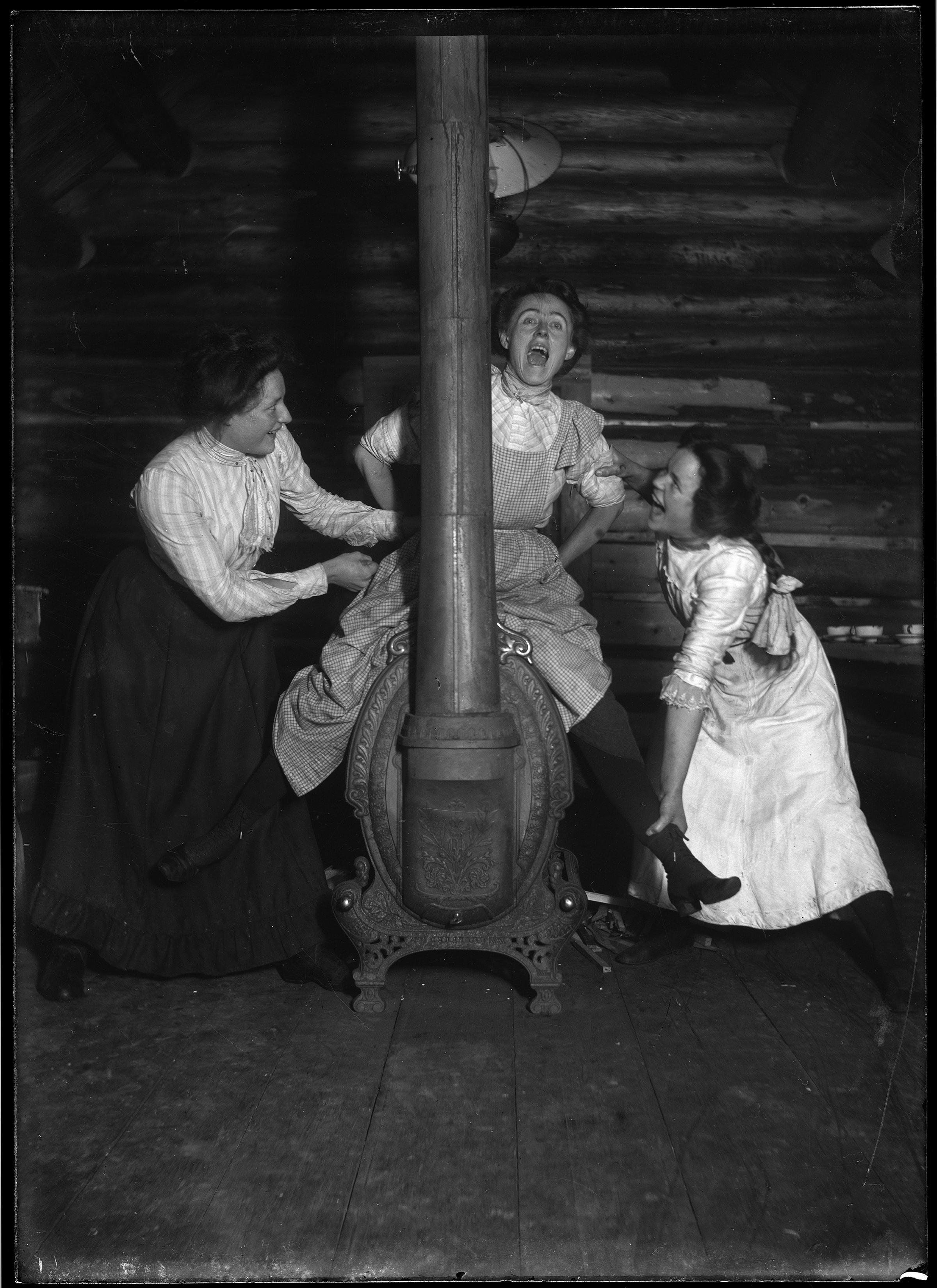 Old school hot - Mattie on a hot stove, Vancouver, 1902.png