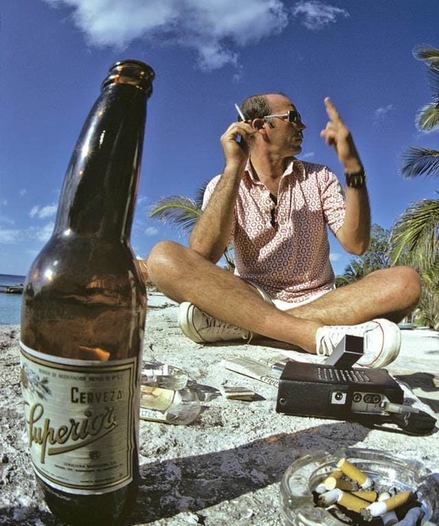 Hunter S. Thompson drinking beer in Mexico, 1974.jpg