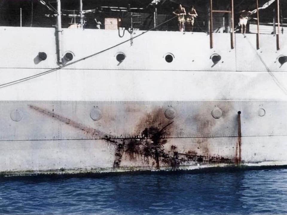 An imprint of a Kamikaze attack on the HMS Sussex, 1945.jpg