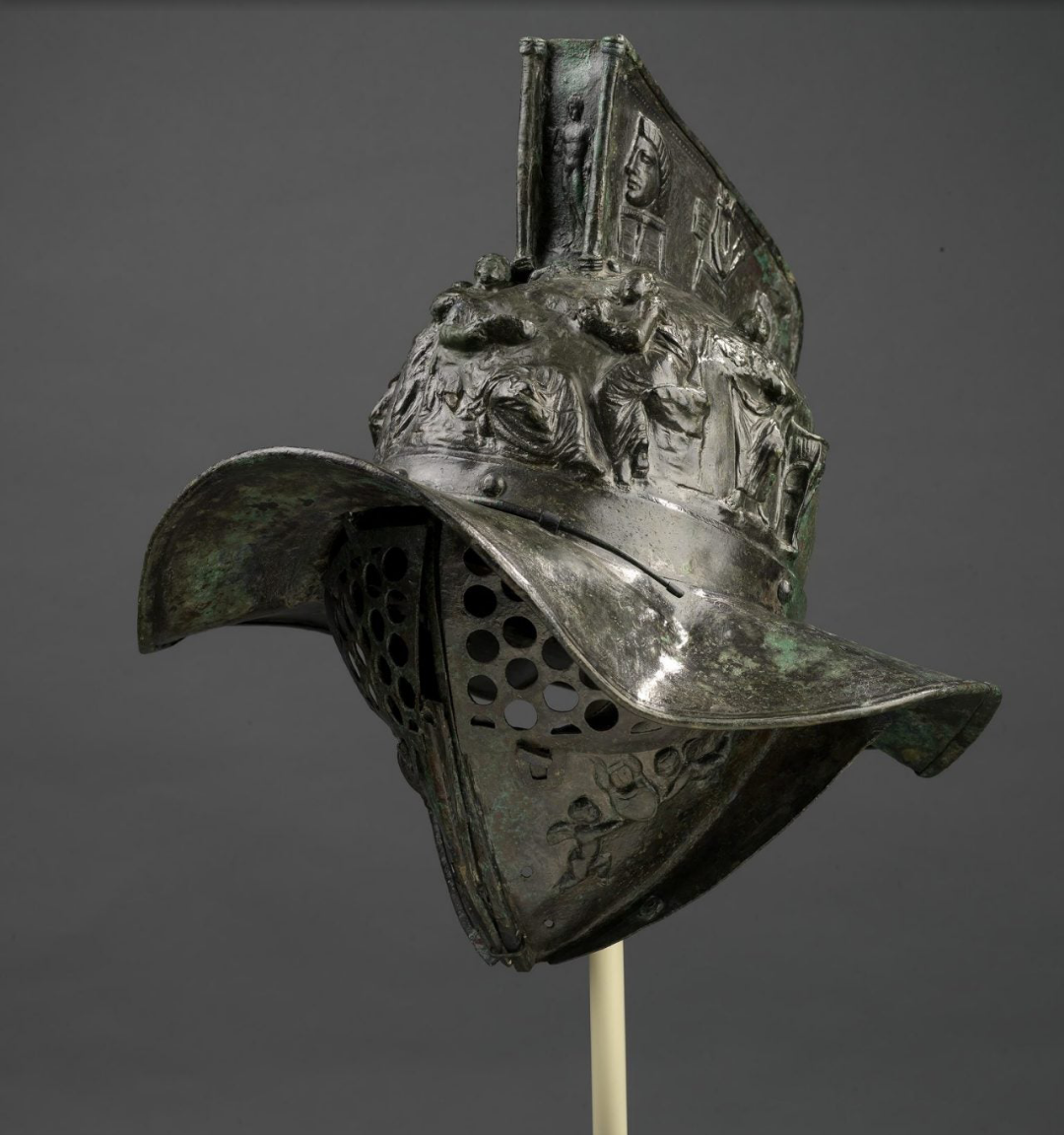 Ancient Roman gladiator helmet, unearthed in the arena at Pompeii.png