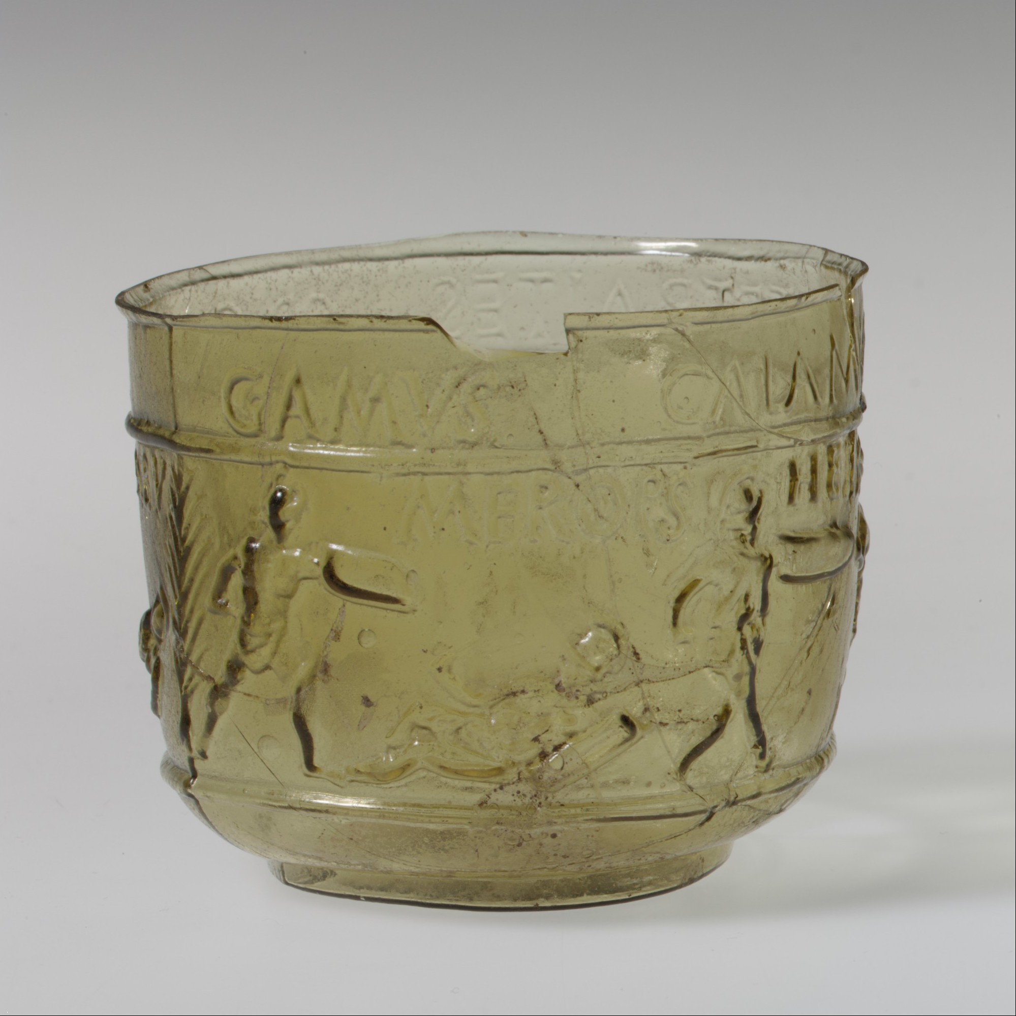 Ancient Roman glass cup featuring four pairs of identified gladiators fighting, c. 50-80 AD.jpg