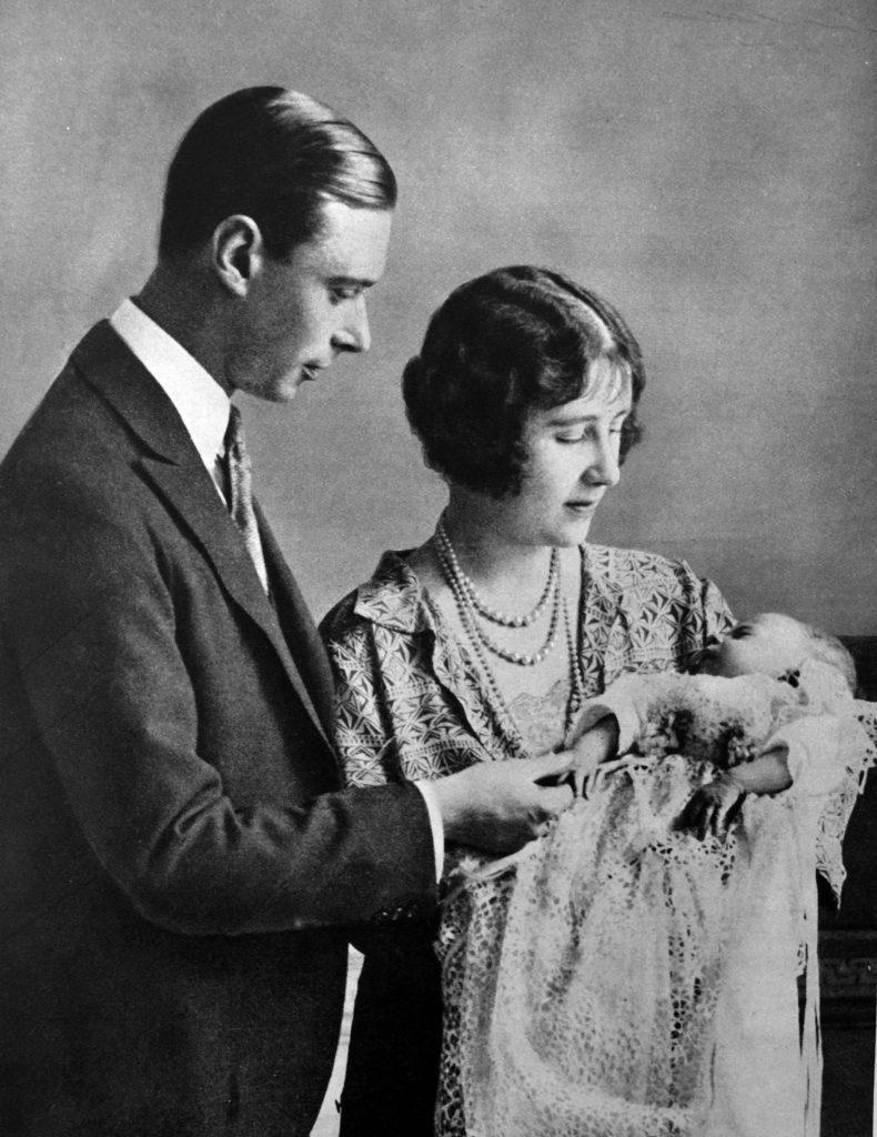 Queen Elizabeth as a baby with her parents, the Queen Mother and George VI, sometime in the 1920s.jpg
