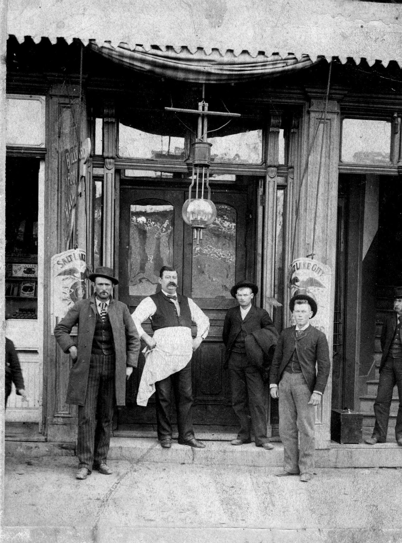 The Fountain beer hall, its proprietor, and some customers, 1890s.jpg