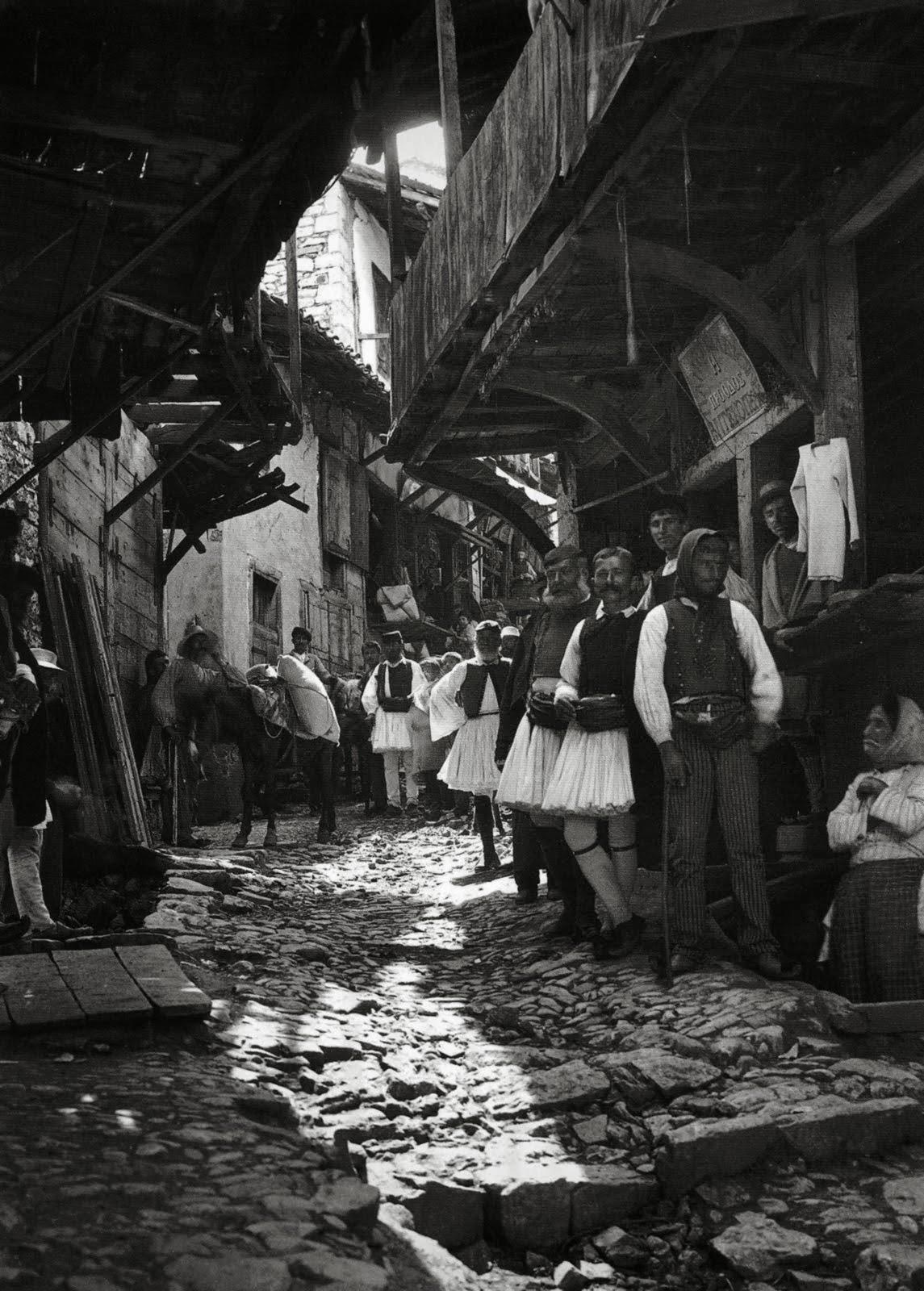 Villagers in the market of Andritsaina, Greece, 1903.jpg
