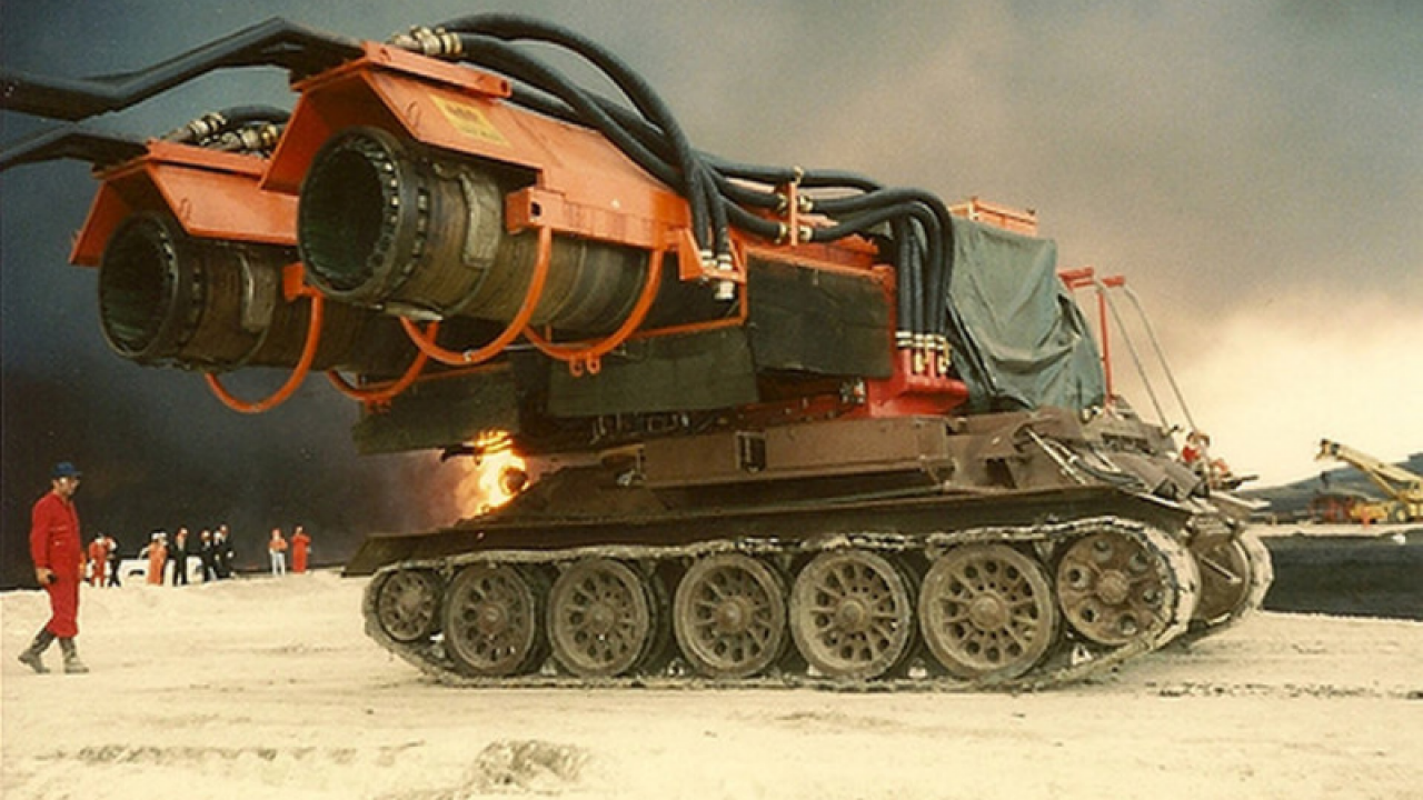 Big Wind. A modified T-34 tank built for fire fighting. It has two MiG-21 engines on top with hoses above them.png