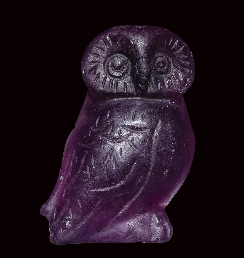 Purple fluorite owl carving from the 4th-3rd century BC, Greece.jpg