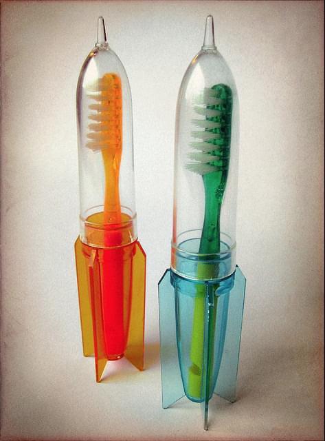 1950s Plastic Whistle Toothbrushes with Rocket Holders.jpg