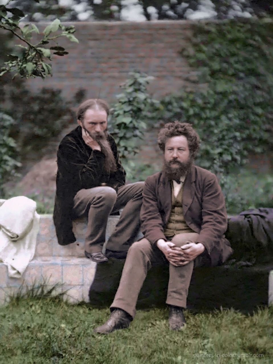 Two Pre-Raphealite lads Edward Burne-Jones and William Morris enjoying a noon on the grass (1880s).jpg