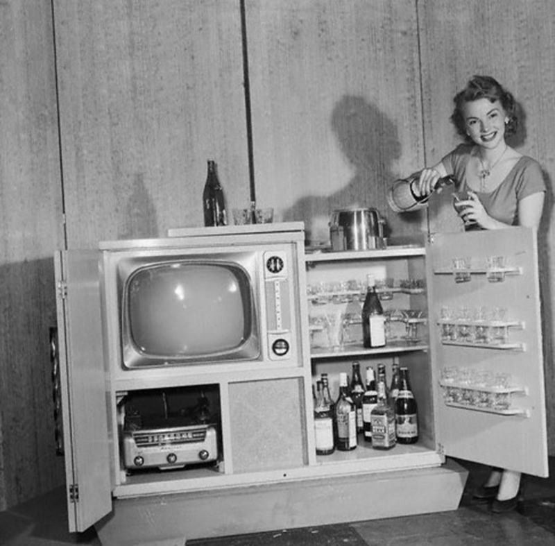 The wonderful 1951 Admiral Tele-Bar, featuring a 21' B&W TV, AM-FM Radio-Phonograph and complete lockable bar. (Waitress not included).jpg