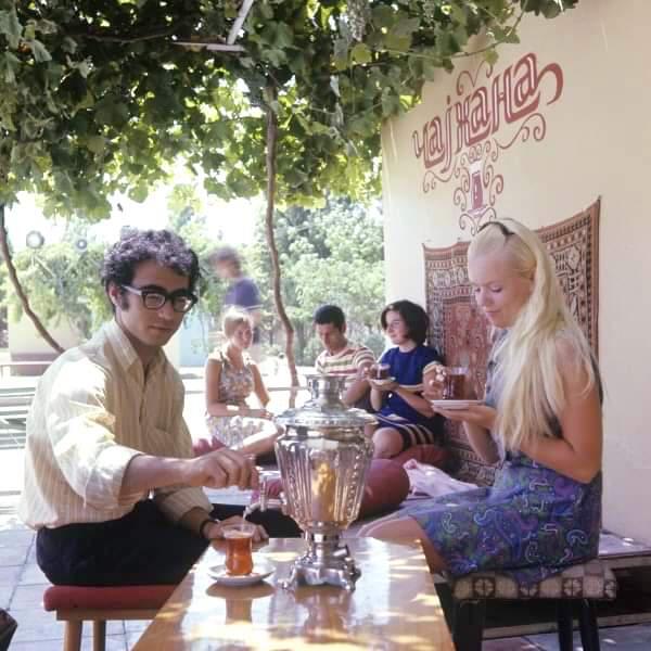 A couple in a teahouse enjoying samowar tea. Azerbaijan, 1973.jpg