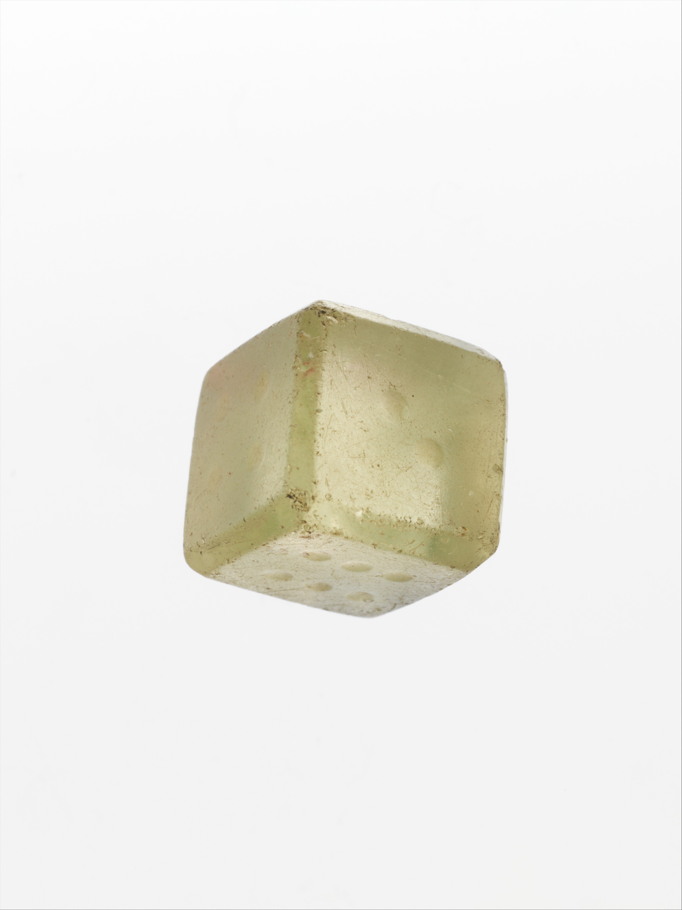 Ancient Roman glass die, c. 1st-2nd century CE.jpg