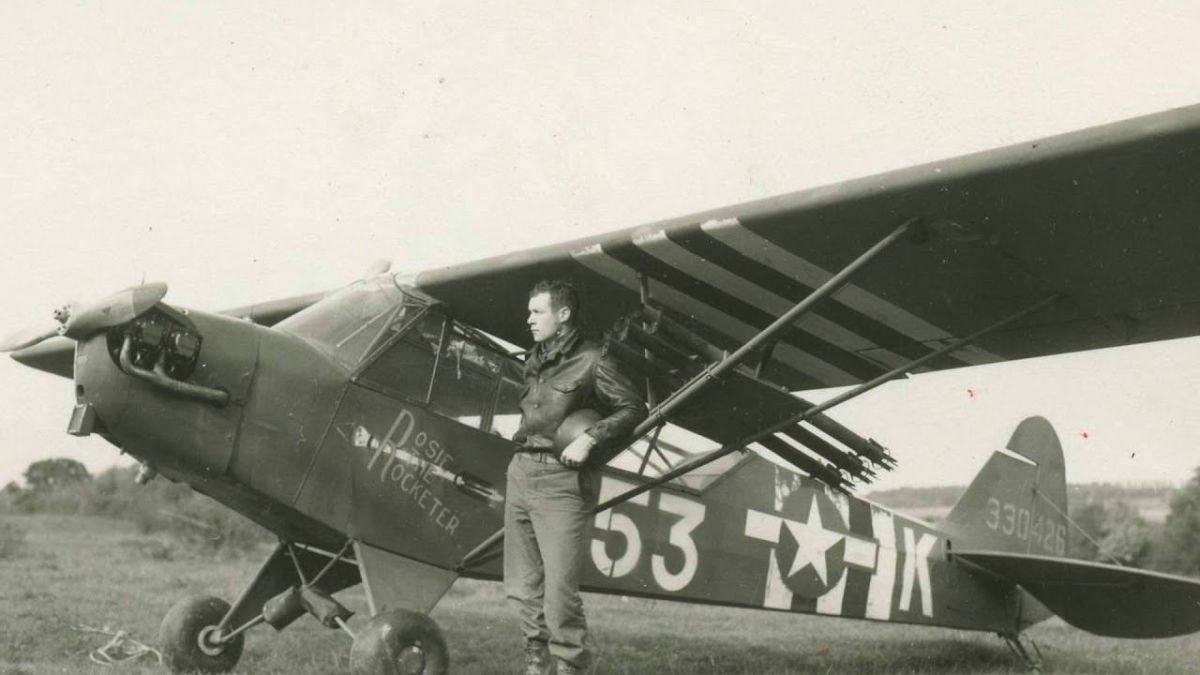 Major Charles Carpenter posing with his bazooka loaded L-4 Grasshopper. He destroyed 4 tanks and one German armored car during the battle of L'orient.jpg