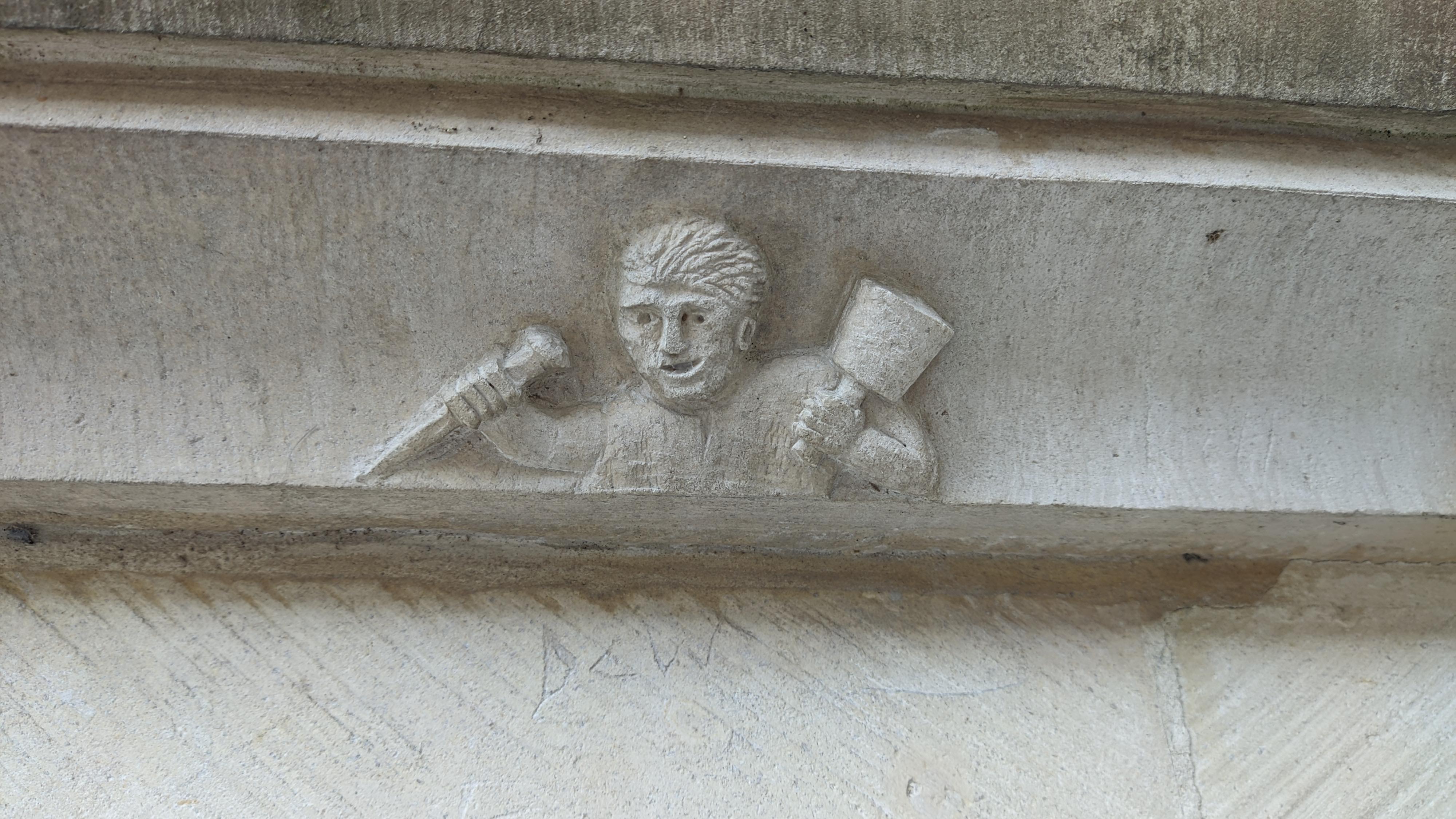 A Sculptor secretly sculpted his own image in a very old cathedral.jpg