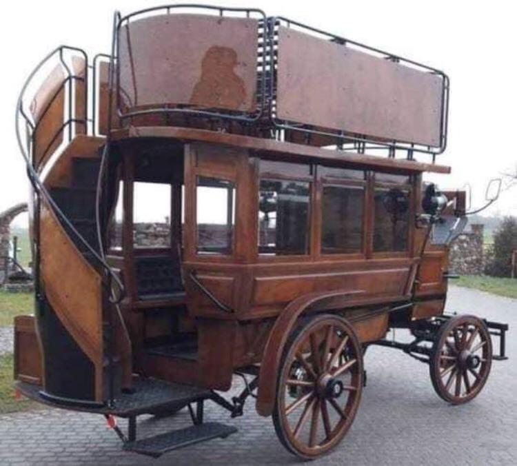 A horse-drawn bus from the 1890’s.jpg