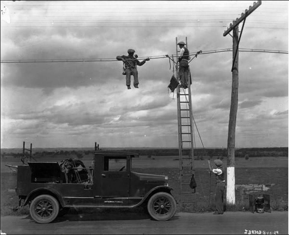 Telephone line repairmen at work, August 15, 1929.jpg