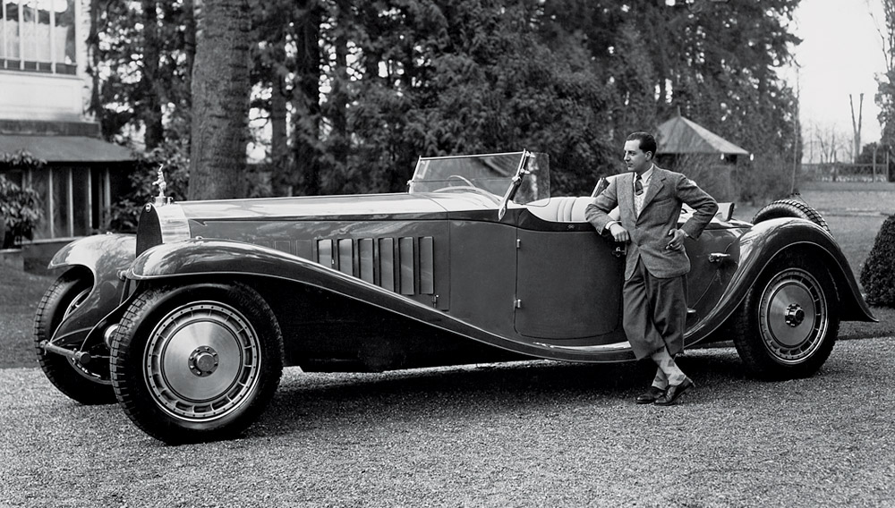 Random Rich Guy standing next to his Bugatti Type 41 Royale (mid 1930's).jpg