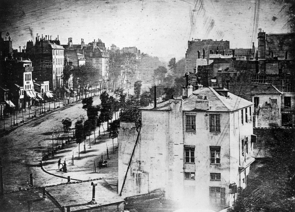 This is believed to be the first ever photograph of a person (bottom left) taken by Louis Daguerre, Paris, 1838.jpg