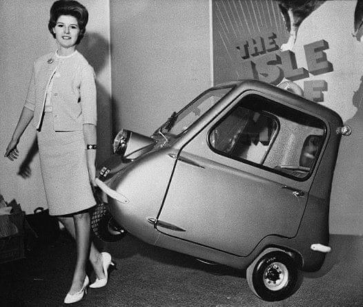 World's smallest car, the Peel P50. Designed as a city car, it was advertised in the 1960s as capable of seating  'one adult and a shopping bag'.jpg