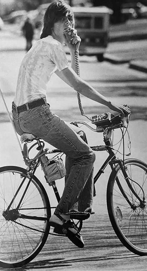 Dude on a bicycle equipped with a CB radio. 1970's.jpg