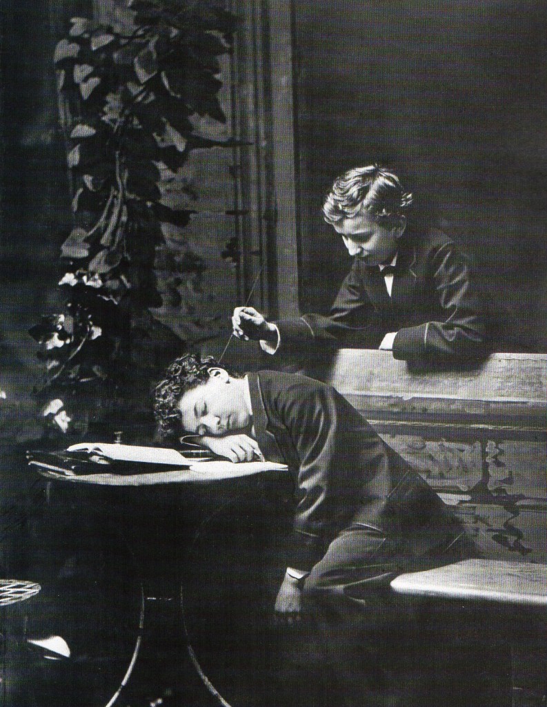 Auguste Lumière (sitting) and his younger brother Louis Lumière in a picture taken at their father's photographic studio in Lyon. France, 1875.jpg