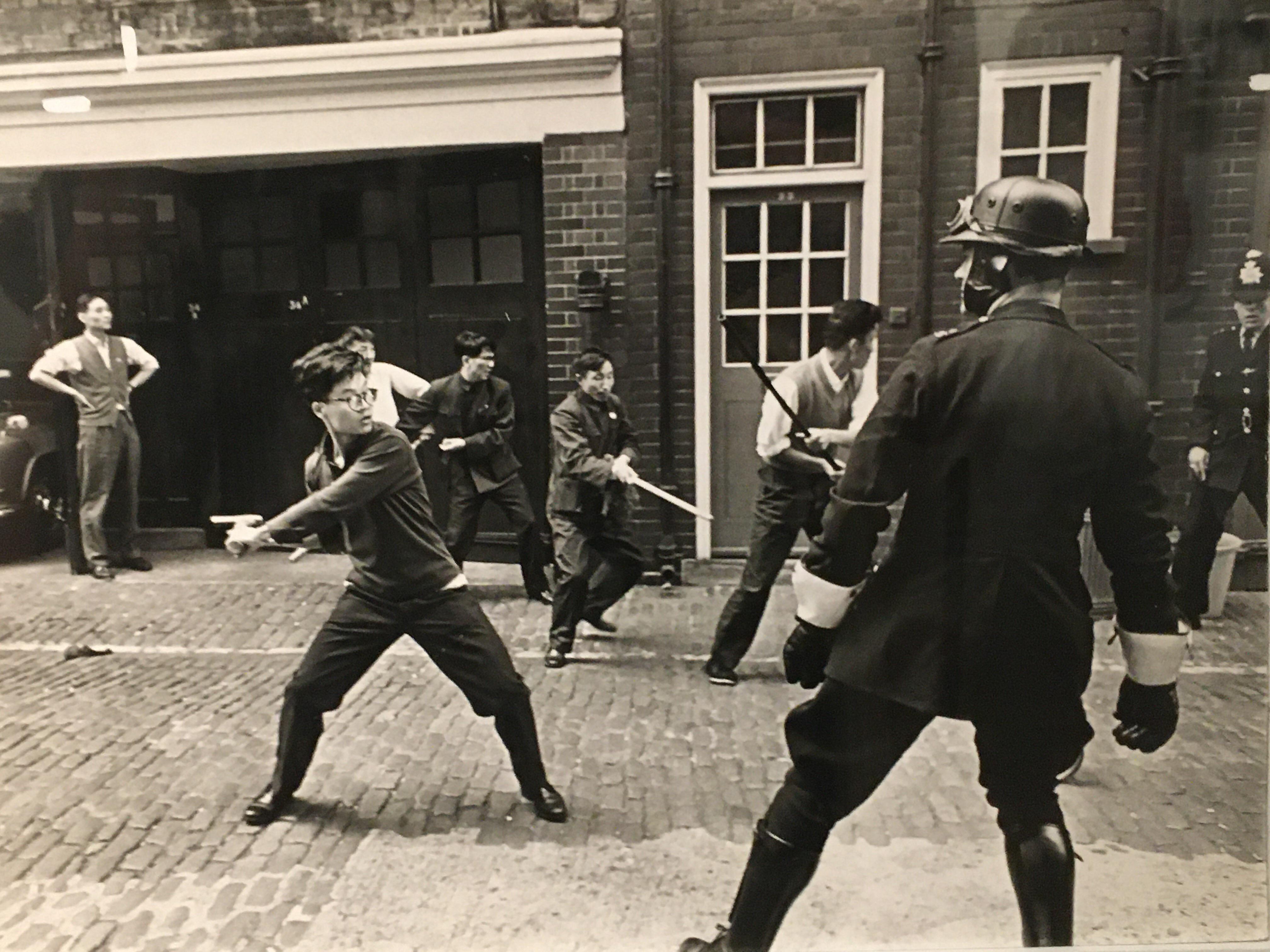 Chinese mission staff fighting with the police. London, 1967.jpg