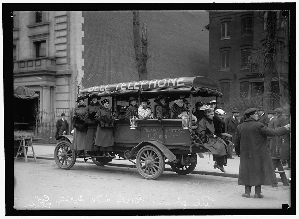 Washington DC - telephone girls riding in a Chesapeake and Potomac Telephone Co. truck (note the chain driven wheels), 1916.jpg