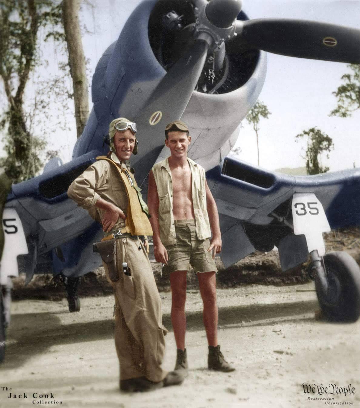 Ensign Hal Bitzegio and a ground crewman by F4U-1A #35 of the VF-17 Jolly Rogers at Ondongo, New Georgia, November 1943.jpg
