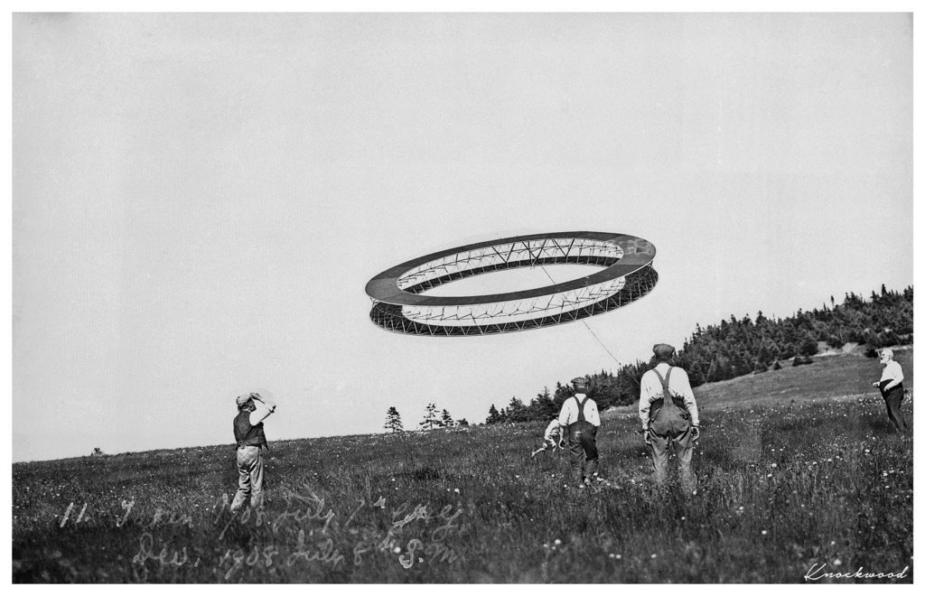 Alexander Graham Bell (right) and his assistants flying a tetrahedral kite, 1908.png