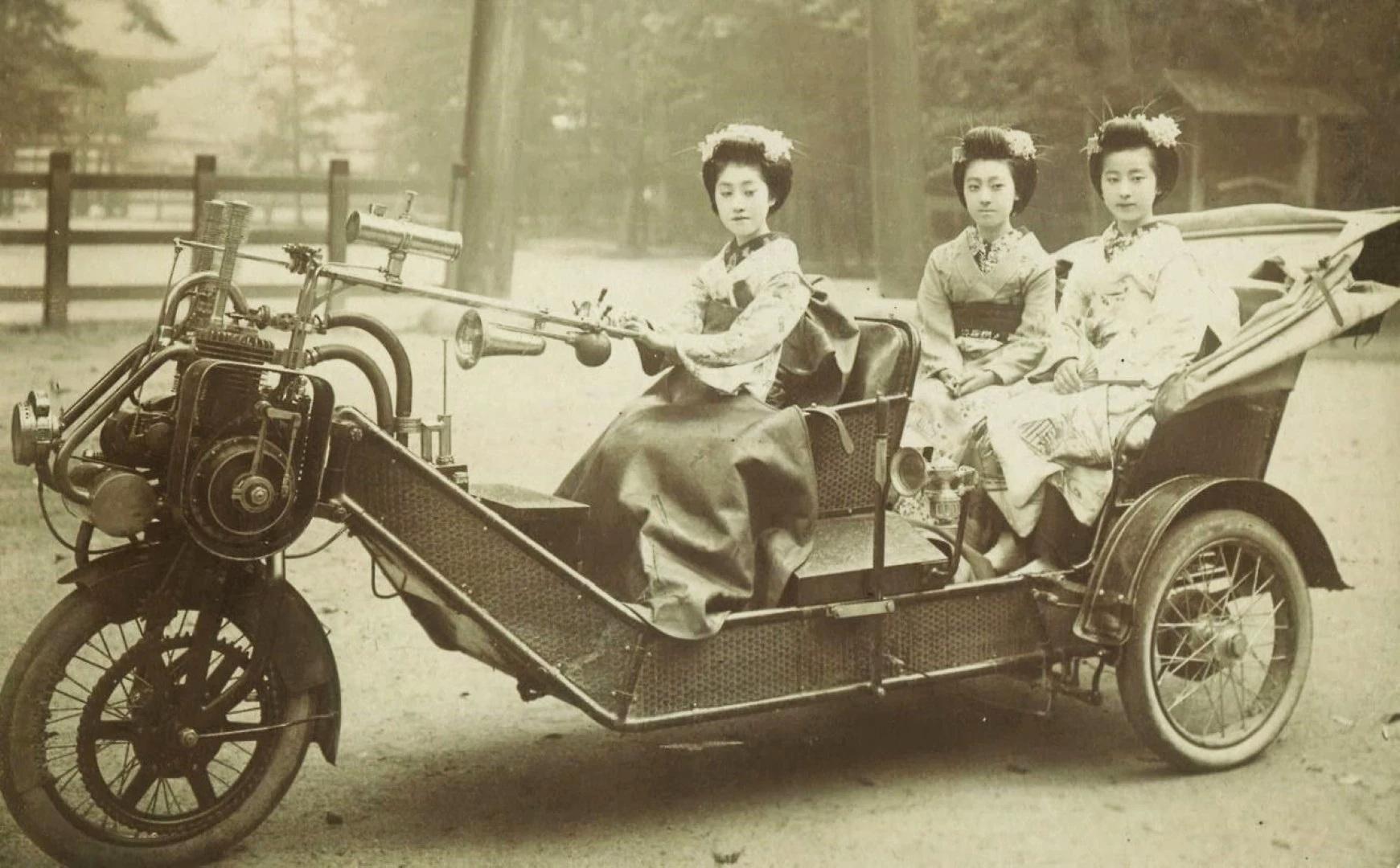 young Japanese women in three-wheeled motor car, circa 1920.jpg